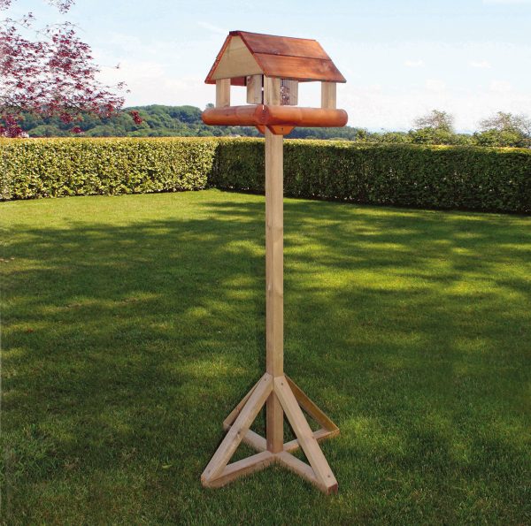 Wooden bird table with built in feeder