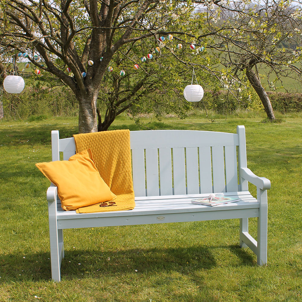 2 seater Hutton Cotswold bench painted and in a garden setting